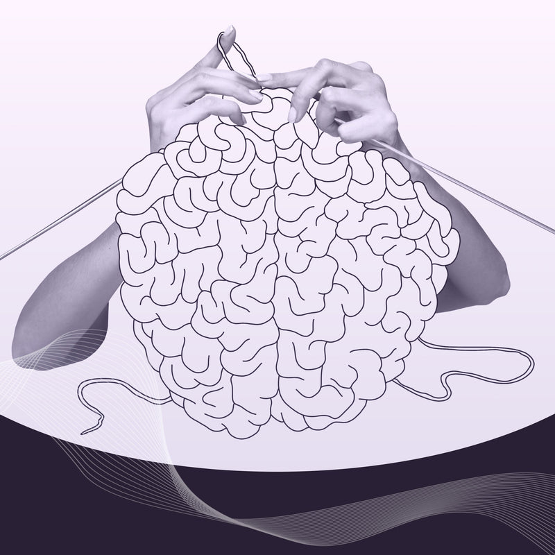 Hands knitting a brain-shaped ball of yarn in purple tones