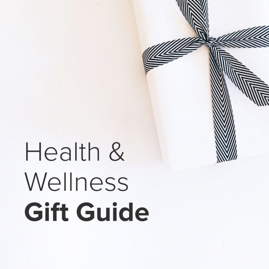 Wrapped white gift with black-and-white herringbone ribbon; text on image reads: Health & Wellness Gift Guide
