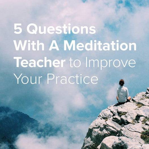 5 Questions With A Meditation Teacher to Improve Your Practice — person seated on rocky cliff overlooking clouds