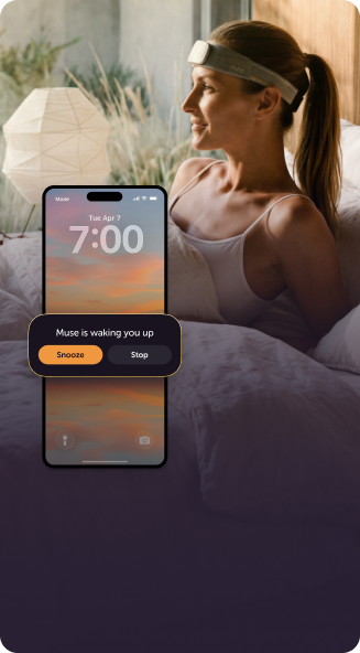 A phone lock screen at 7:00 with Muse waking the user, over a woman sitting up in bed wearing the Athena band
